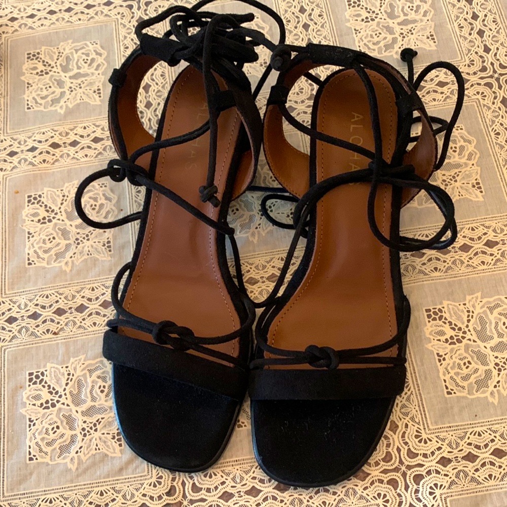 Brand NEW ALOHAS strappy sandal. The size is 38 and they are a black suede.